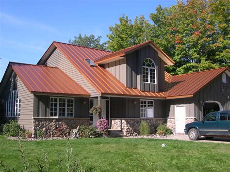 copper metallic metal roof on brick house|ranch house with metal roof.